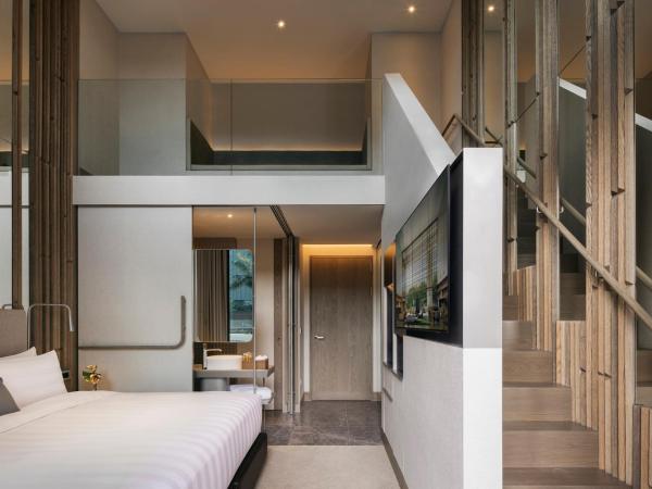 Pan Pacific Orchard : photo 4 de la chambre loft avec accès à la piscine du club de plage