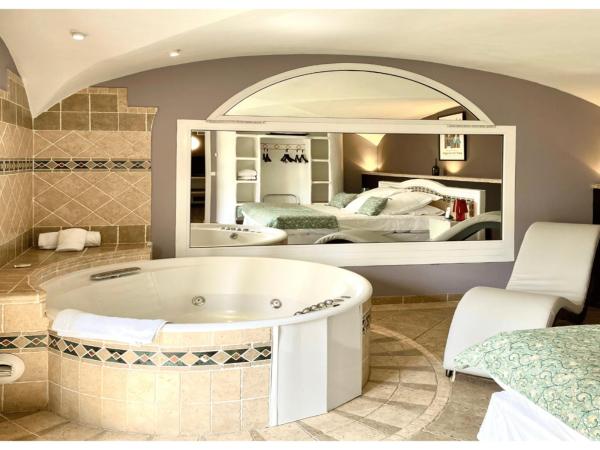 Ostella Spa & Resort : photo 1 de la chambre suite romantique avec jacuzzi