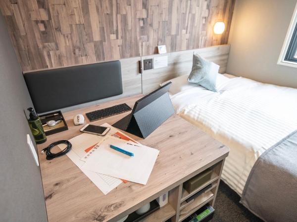 Super Hotel Premier Namba Shinsaibashi Natural Hot Spring : photo 7 de la chambre chambre double standard