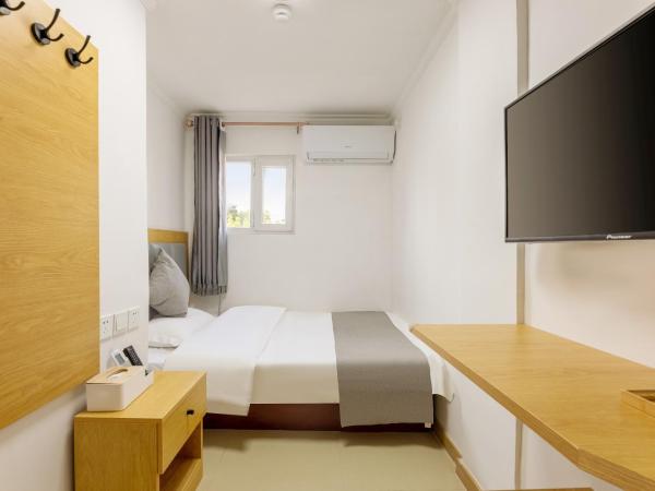 Happy Dragon Hotel - close to Forbidden City&Wangfujing Street&free coffee &English speaking,Newly renovated with tour service : photo 2 de la chambre chambre simple