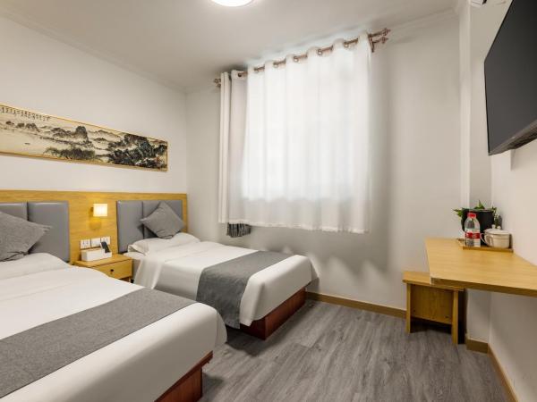 Happy Dragon Hotel - close to Forbidden City&Wangfujing Street&free coffee &English speaking,Newly renovated with tour service : photo 2 de la chambre chambre lits jumeaux