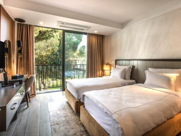 Unique Life Style Hotel : photo 2 de la chambre chambre double ou lits jumeaux deluxe – vue sur jardin