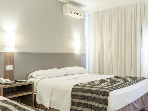 Lancaster Hotel by Castelo Itaipava : photo 3 de la chambre chambre quadruple standard