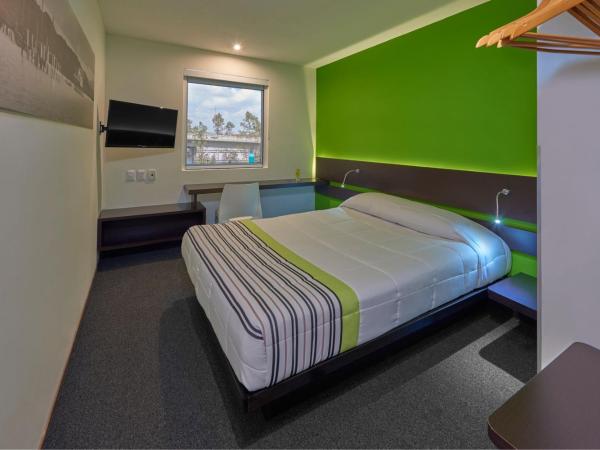 City Express Junior by Marriott Puebla FINSA : photo 1 de la chambre chambre lit queen-size 