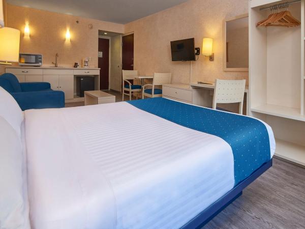 City Express by Marriott Puebla Angelopolis : photo 3 de la chambre suite lit queen-size avec canapé-lit