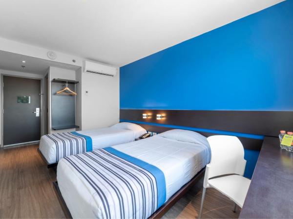 City Express Junior by Marriott Merida Altabrisa : photo 1 de la chambre chambre lits jumeaux