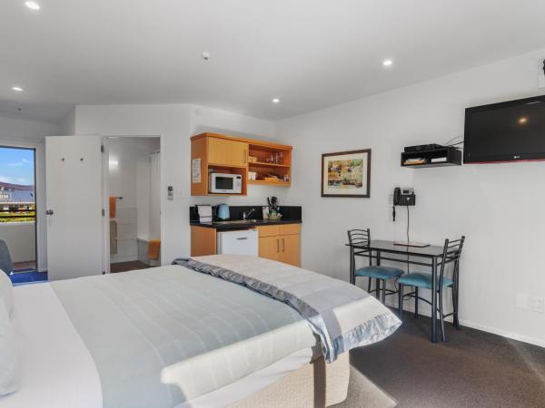 Lorenzo Motor Lodge : photo 1 de la chambre suite deluxe avec baignoire spa