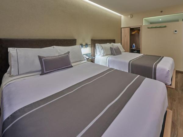 City Express Plus by Marriott Mazatlan : photo 2 de la chambre chambre avec 2 grands lits queen-size