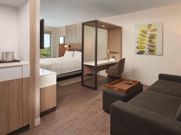 SpringHill Suites by Marriott Orlando Lake Nona : photo 1 de la chambre suite lit king-size avec lit gigogne