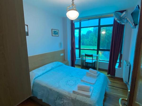 Hostal Pumar : photo 1 de la chambre chambre double standard avec salle de bains commune