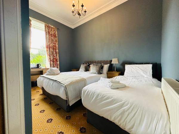 Abbotsford Guest House : photo 1 de la chambre chambre triple deluxe