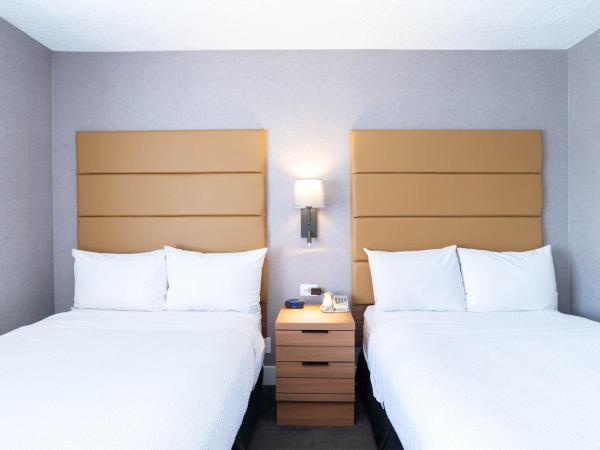 Sandman Hotel Victoria : photo 3 de la chambre standard suite, 2 double beds, sofa bed, kitchenette