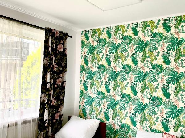 Happy Living Hostel : photo 2 de la chambre chambre triple avec balcon