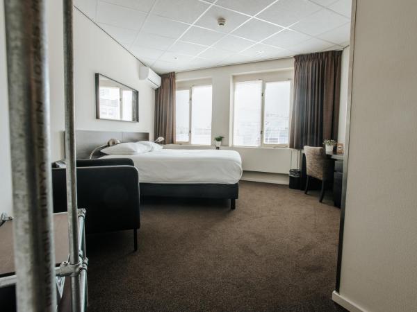 Queen Hotel : photo 5 de la chambre chambre lit king-size