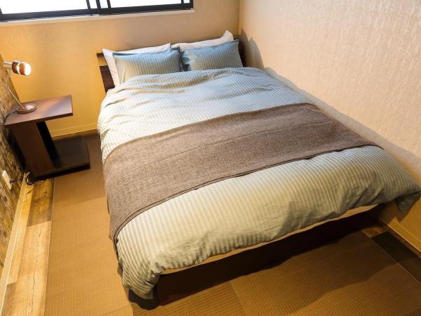 Guesthouse Kobe Nadeshikoya : photo 2 de la chambre chambre triple avec salle de bains commune