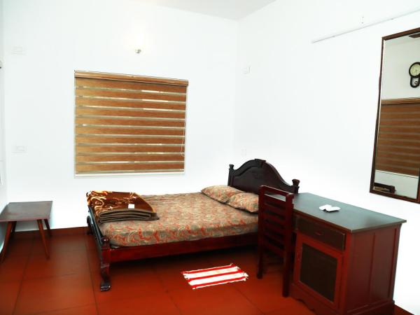 Back Packers Cochin Villa : photo 1 de la chambre chambre simple avec salle de bains privative