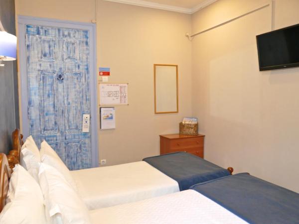Guest House Sao Filipe : photo 2 de la chambre chambre lits jumeaux