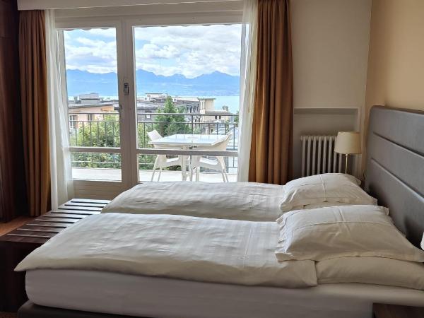 Elite : photo 2 de la chambre chambre lits jumeaux - vue sur lac