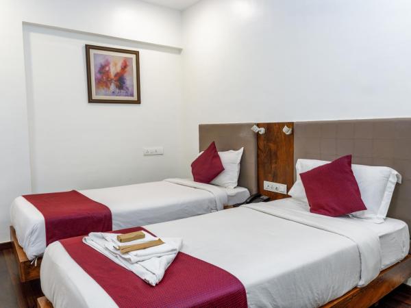 J Hotel and Banquets : photo 7 de la chambre chambre double ou lits jumeaux supérieure