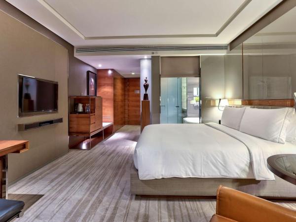 Hilton Sukhumvit Bangkok : photo 3 de la chambre chambre lit king-size deluxe