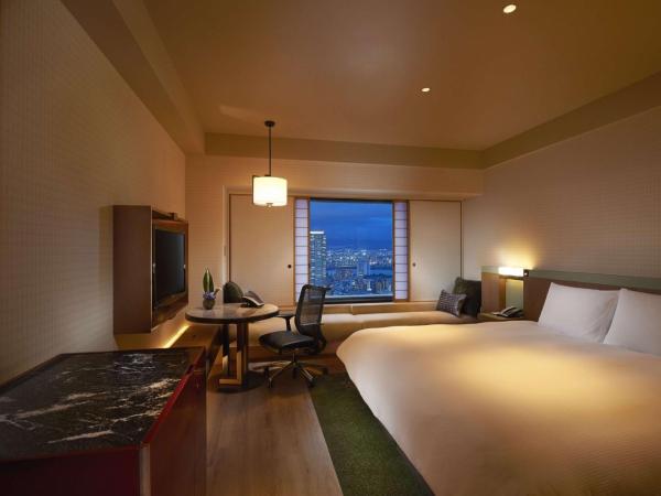 Hilton Osaka Hotel : photo 4 de la chambre chambre lit king-size exécutive