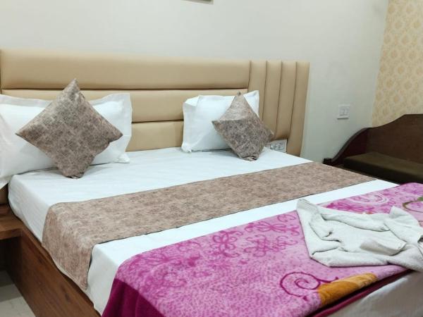 Hotel Siddhi Vinayak : photo 5 de la chambre chambre supérieure lit queen-size