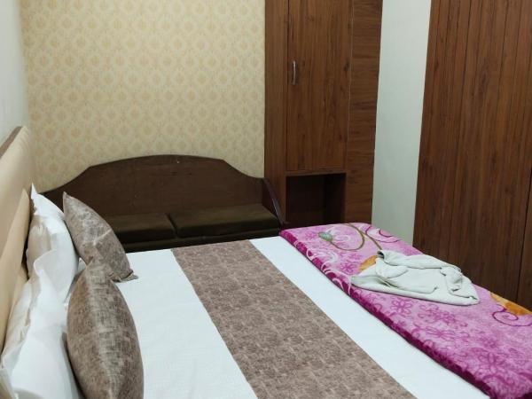 Hotel Siddhi Vinayak : photo 9 de la chambre chambre supérieure lit queen-size