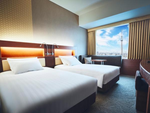 Lotte City Hotel Kinshicho : photo 1 de la chambre chambre lits jumeaux standard avec canapé