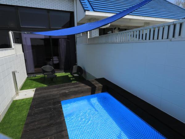 Osaka Hokko Marina HULL : photo 4 de la chambre chambre double - vue sur jardin