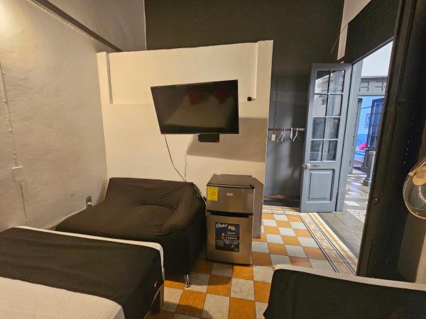 Central Downtown Guadalajara : photo 2 de la chambre chambre double avec 2 lits doubles