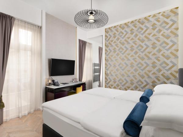 Maison Bistro & Hotel : photo 1 de la chambre chambre double deluxe dans petite maison