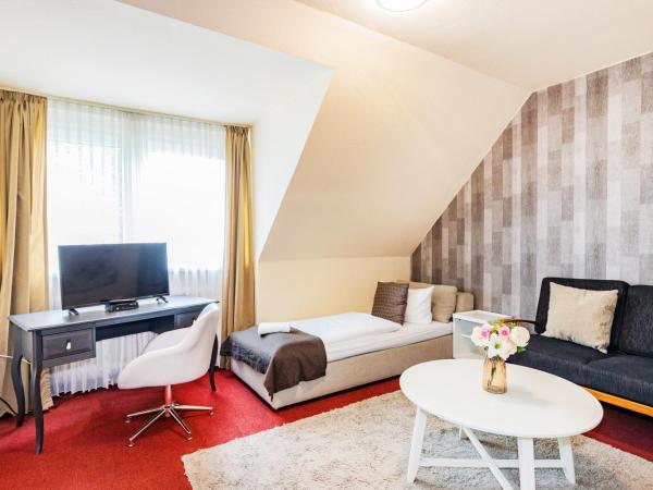 Hotel Fürst Garden : photo 3 de la chambre chambre triple