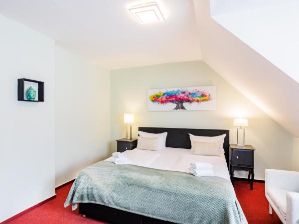 Hotel Fürst Garden : photo 1 de la chambre chambre quadruple