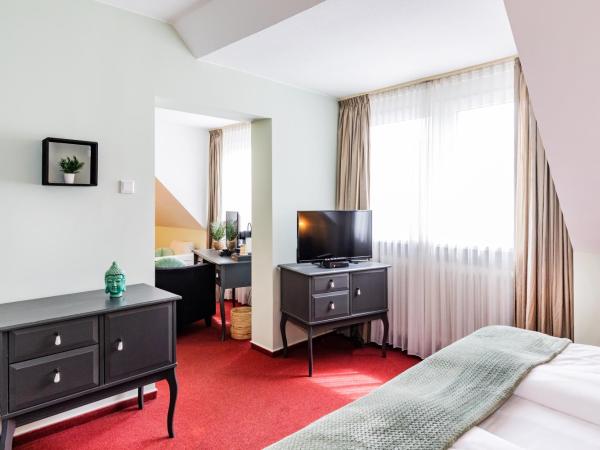 Hotel Fürst Garden : photo 3 de la chambre chambre quadruple