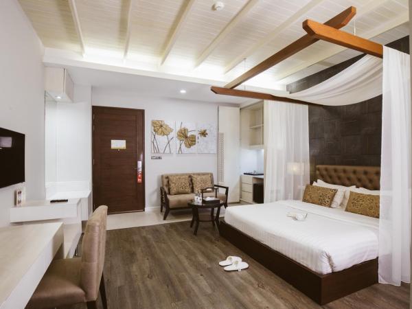 De Chai Colonial Hotel & Spa - SHA Plus : photo 7 de la chambre grande chambre double ou lits jumeaux deluxe