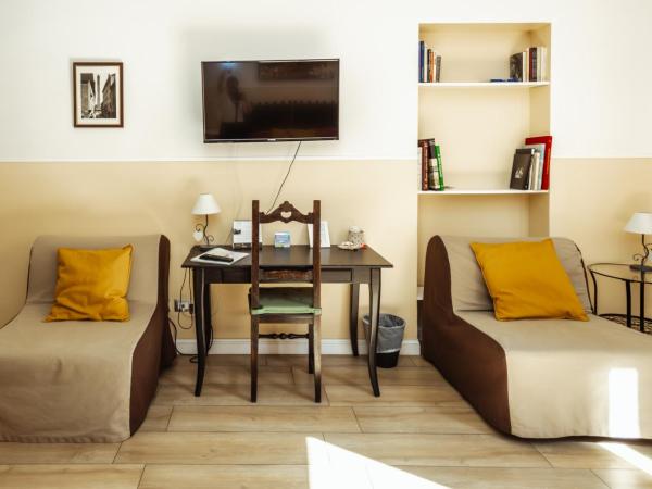 Il Tiro Rooms : photo 3 de la chambre chambre triple avec salle de bains privative