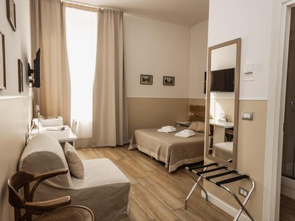 Il Tiro Rooms : photo 1 de la chambre chambre triple avec salle de bains privative