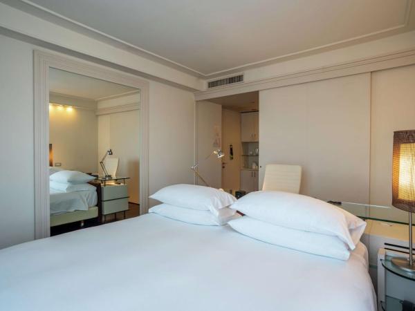 Hilton Florence Metropole : photo 3 de la chambre chambre lit king-size deluxe - vue sur ville