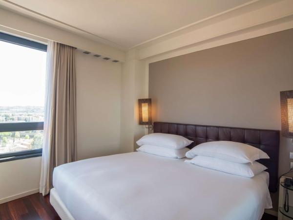 Hilton Florence Metropole : photo 3 de la chambre chambre lit king-size - vue sur ville