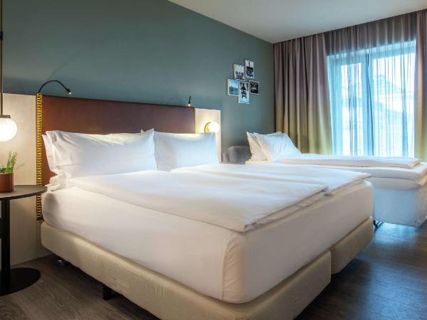 Hilton Garden Inn Mannheim : photo 1 de la chambre chambre lit king-size supérieure avec canapé-lit