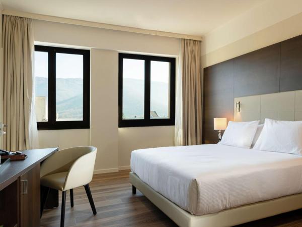 DoubleTree by Hilton Brescia : photo 3 de la chambre chambre lit king-size deluxe