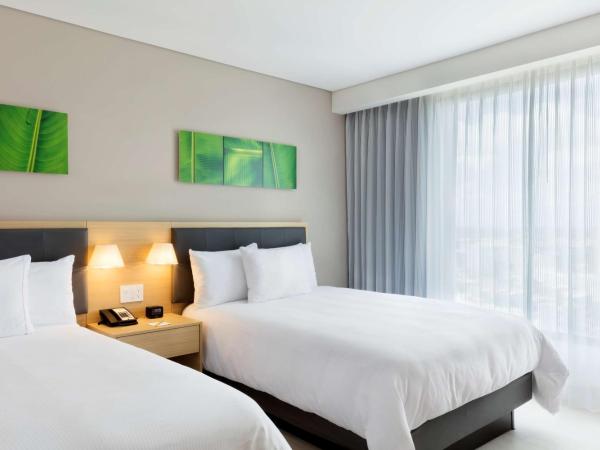 Hilton Garden Inn Merida : photo 1 de la chambre chambre double avec 2 lits doubles