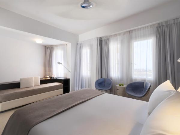 The Majestic Hotel : photo 3 de la chambre chambre triple avec vue sur le volcan