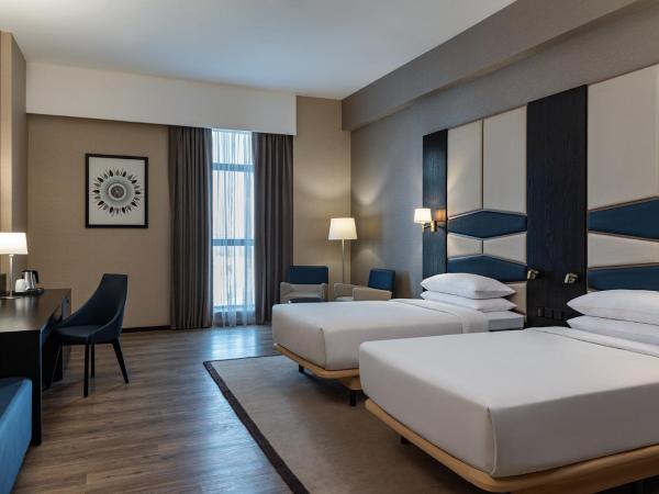 Four Points by Sheraton Production City, Dubai : photo 1 de la chambre deluxe twin, (comp. shuttle to dmcc metro, marina mall & jbr, 20% off on f&b outlet)