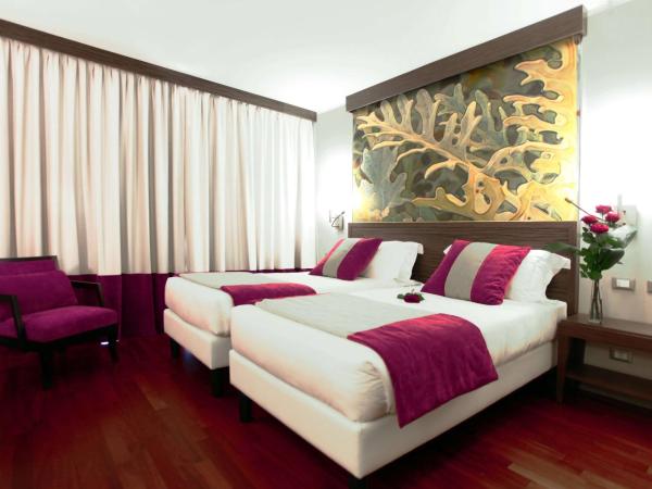 Ramada Plaza Milano : photo 1 de la chambre chambre lits jumeaux avec douche