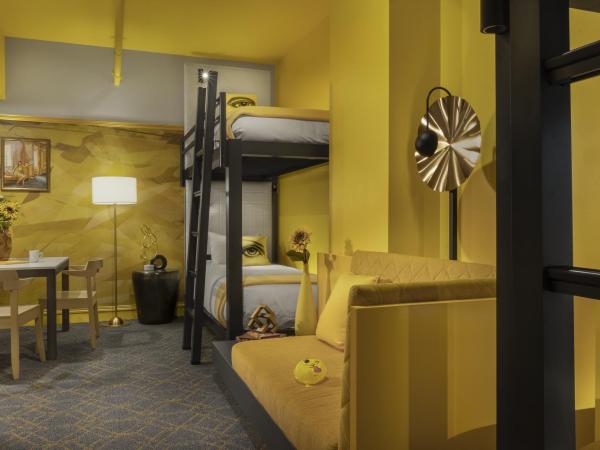 Angad Arts Hotel : photo 2 de la chambre lits superposés doubles