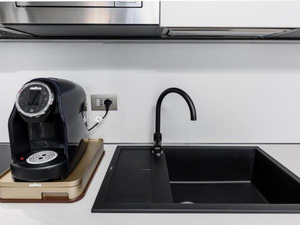 Q71 TIMELESS SUITES : photo 6 de la chambre suite - vue sur ville