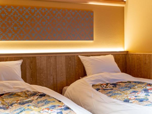 Nishiyama Ryokan - Established in 1953 : photo 10 de la chambre chambre lits jumeaux deluxe