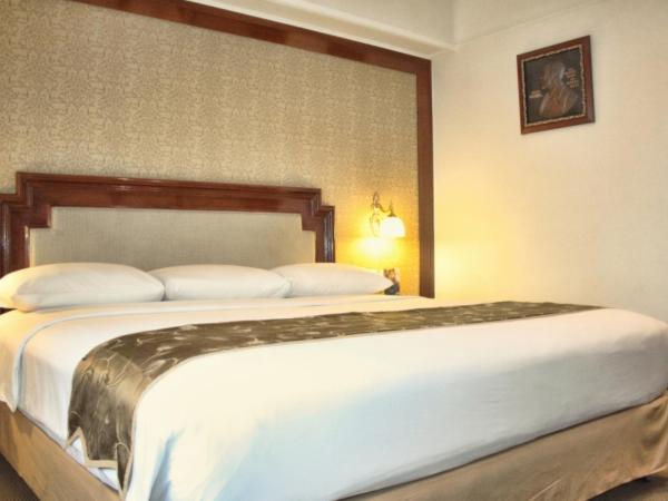 Golden Boutique Hotel Melawai : photo 1 de la chambre chambre double ou lits jumeaux exécutive