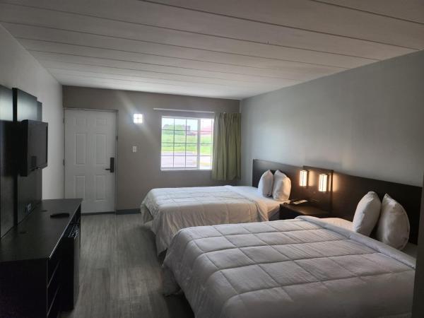 Royal Inn Hotel : photo 3 de la chambre chambre lit queen-size deluxe